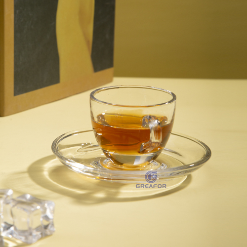 Diseños personalizados, venta al por mayor, taza de vidrio para café transparente con plato