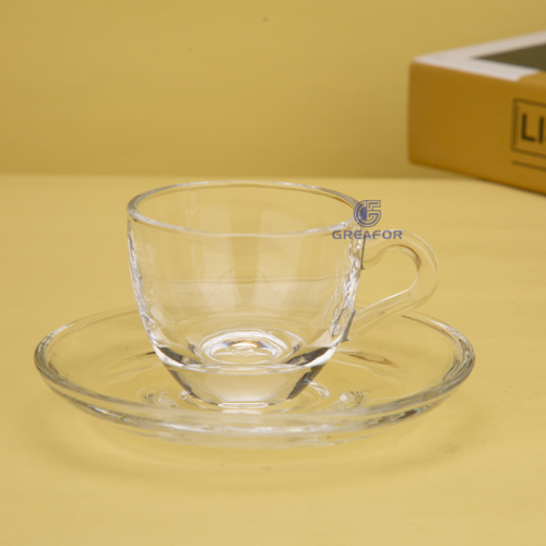 Diseños personalizados, venta al por mayor, taza de vidrio para café transparente con plato